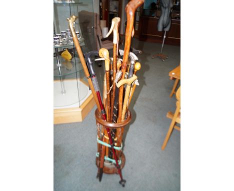 Vintage stick stand with a large assortment of sticks