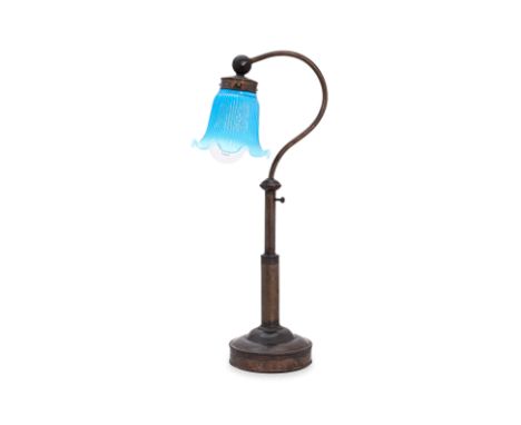A COPPER BASE LAMP WITH GLASS SHADE
Table lamp with re-claimed copper base and blue glass shade, has European type C plug
51c