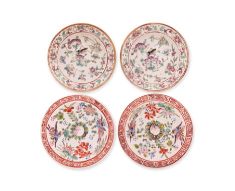A GROUP OF FOUR FAMILLE ROSE SAUCERS
Including two plates decorated with pheasants and a central peach medallion on a white g