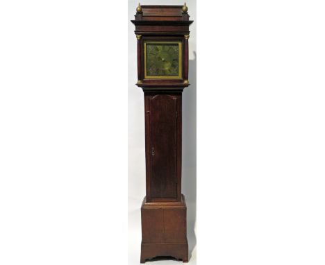 An 18th Century longcase clock The unsigned 25cm square brass dial, with single hand and Roman chapter ring and pierced brass