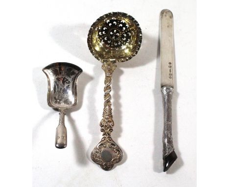 A collection of silver itemsComprising a Victorian Edinburgh hallmarked silver paper knife with leg and hoof handle, a furthe