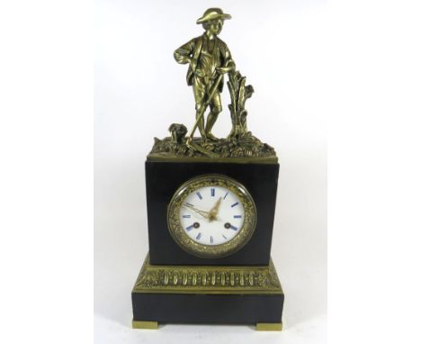 A late 19th Century French figural mantel clockThe circular white enamel dial with Roman numerals and floral mounted bezel, t