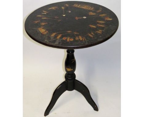 A 19th Century black lacquered pedestal tableThe top decorated with insects and mother of pearl inlay, raised on a turned col