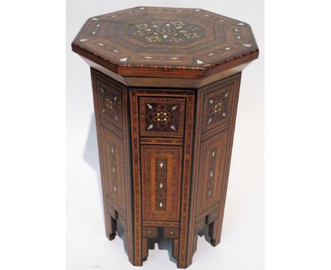 A Syrian Damascus occasional tableOf octagonal form, profusely inlaid with mother of pearl and stained wooden geometric detai