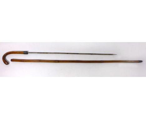 A sword stick, late 19th Century54cm blade, with white metal ferrule, bamboo grip and matching scabbard.CONDITION REPORTSplit