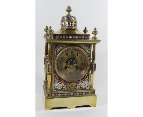A fine quality 19th Century French brass and Champlevé enamel mantel clockHaving pierced finial above circular dial with Arab