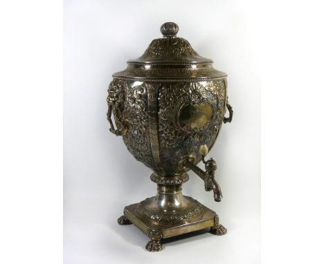 A large and impressive George III silver samovar/tea urnThe circular lid with artichoke finial and foliate decoration the bod