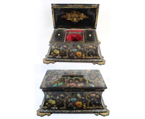 A large Victorian mahogany papier mache tea caddyOf waisted form, painted and gilded with birds of paradise and inlaid with m