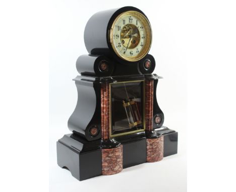 A 19th Century French slate and marble mantel clockRetailed by H. Cahuet Paris, the circular dial with Arabic numerals inside