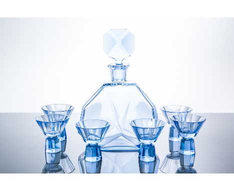 ART DECO BLUE TINTED GLASS LIQUEUR SET
comprising octagonal wedge shaped decanter and stopper and six decagonal stemmed glass
