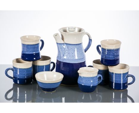 STUDIO POTTERY COFFEE SET BY TOM LOCHHEAD
circa 1970s, comprising a coffee pot, sugar, cream, and six coffee cups, glazed wit