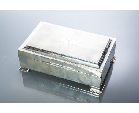 GEORGE V SILVER CIGARETTE CASKET
maker Joseph Gloster Ltd., Birmingham 1935, the hinged lid with engine turned design, the ca