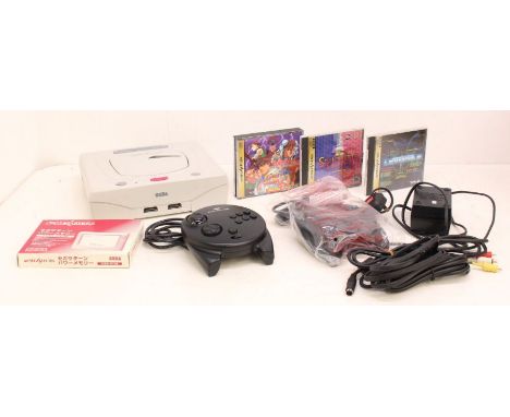 Sega: An unboxed Sega Saturn 'white' console, together with two black Sega Saturn controllers, various cables, together with 