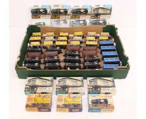 OO Gauge: A collection of assorted kit built rolling stock wagons to include: Esso and Blue Circle. Together with fourteen em