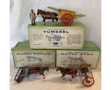 Britains: A collection of three boxed Britains items to comprise: Tumbrel Cart 4F, Horse Roller 9F, and Horse Rake 8F. All in