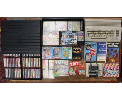 Commodore: An unboxed Commodore 64 console and system, together with a good collection of assorted Commodore 64 cassettes inc