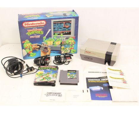 Nintendo: A boxed Nintendo Entertainment System (NES) console, containing console, two controllers, cables, and boxed Teenage