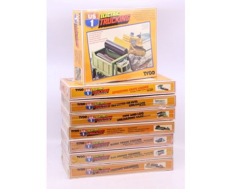 Tyco: A collection of assorted boxed Tyco, US 1 Electric Trucking HO Scale Kits, mostly sealed, to include: Elevated Gravel U