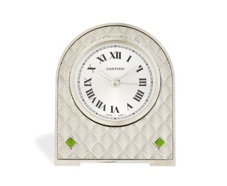 Cartier. A stainless steel Belle Epoque style desk clockStainless steel arch form surround with engine turned foliate motif a