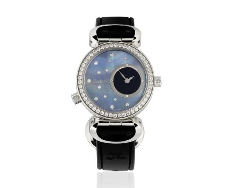 Korloff. A lady's stainless steel and diamond set quartz reversible wristwatch with dual mother of pearl dialsModel: Cassiope