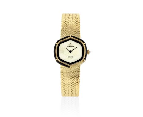 Eterna watch. A lady's 18K gold and onyx quartz bracelet watch with mother of pearl dialDate: Circa 2000Movement: 6-jewel ETA