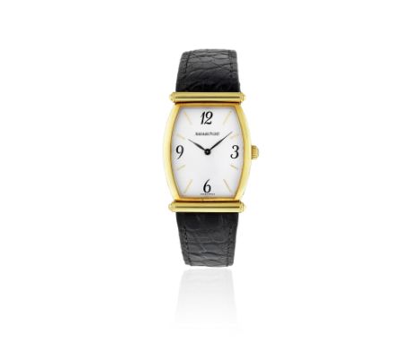 Audemars Piguet. A lady's 18K gold manual wind tonneau form wristwatchModel: CarnegieReference: 14941BA/002Date: Purchased 5t
