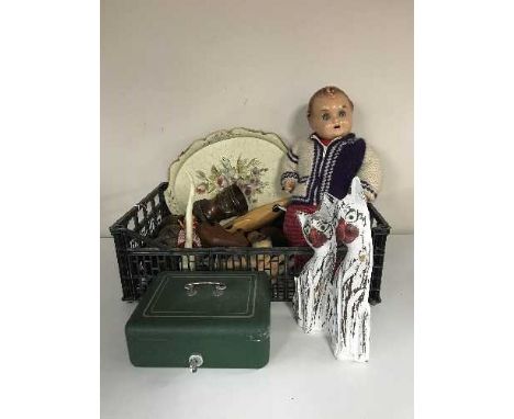 A crate containing cash box with key, wooden cat ornaments, 1950's doll, child's tea service etc 
