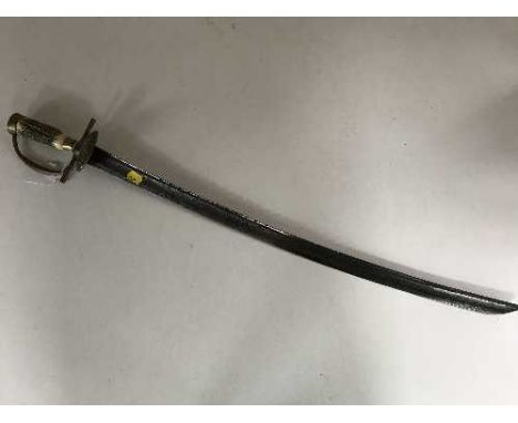 A 19th century hunting sword or hanger, probably German, with 68cm curved and etched blade, antler grip and brass shell guard