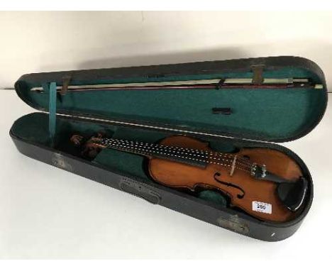 A German violin, circa 1900, labelled within 'Copy of Antonius Stradivarius, Made in Germany', in coffin case with bow