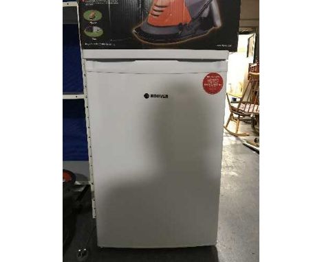 A Hoover under bench fridge