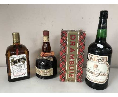 Alcohol including a 75cl Drambuie in presentation box, together with 70cl bottle of Grand Marnier Cognac, 1 litre bottle of C