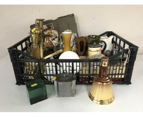 A crate containing English pewter, Spode Scotch whiskey decanter, Doulton jug, brass candlesticks etc