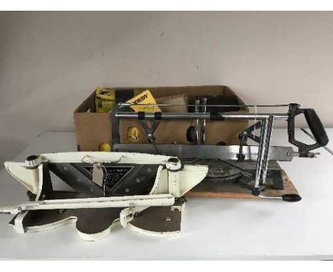 A Draper mitre saw, an Aptc mitre trimmer and a box of assorted steel wool, sand paper, belt sander paper etc 