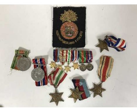 A group of six WWII medals with ribbons and accompanying miniature medals inc. Africa Star, The France and Germany Star, Ital