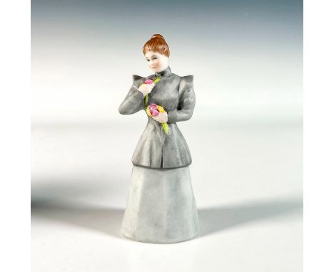 Hand painted in matte finish depicting a lady carefully carrying fresh flowers. Goebel backstamp. This item has its original 