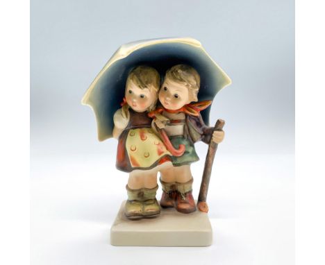 Matte porcelain from the Masterpiece collection. Depicts an adorable scene of two kids walking under a big umbrella. Goebel H
