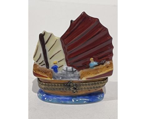 Boldly hand painted and detailed porcelain mini box is in image of iconic Chinese Junk boat with it large rounded sails. With