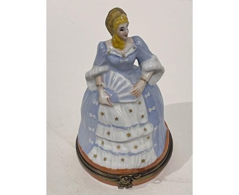 A beautifully depicted Cinderella in pastel blue period gown with fan at the ball hinged porcelain mini box. A gilded pumpkin