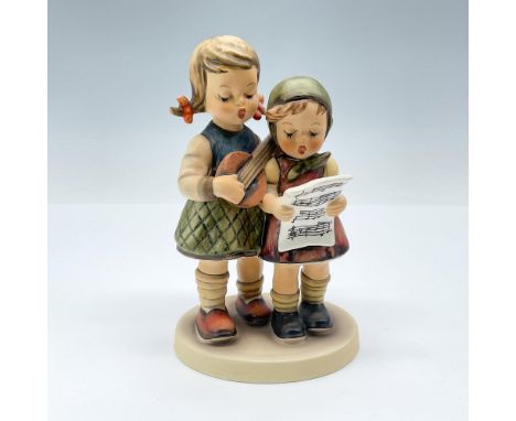 This figurine features a pair of young girls singing together in perfect harmony. TMK#6. Goebel backstamp. Issued: 1979-1990D
