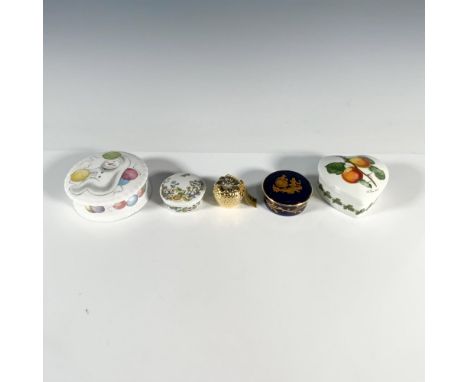A set of 4 jewelry boxes that includes a snowman flying on balloons from the Royal Doulton Snowman Gift Collection, a heart s