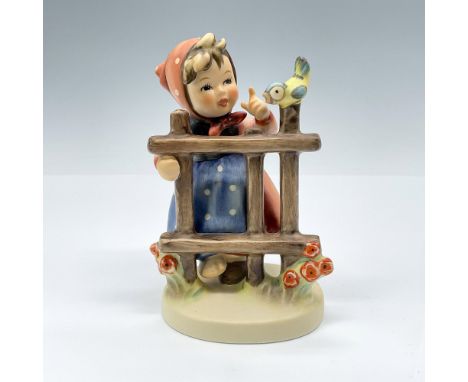This first issue figurine depicts a girl talking to a pretty songbird bird on the fence. Goebel backstamp. TMK#6. Issued: 199