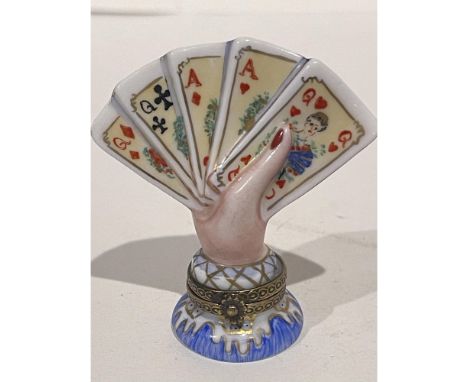 Card players and casino goers will adore this very detailed hand painted ring clad hand holding a lucky full house poker hand