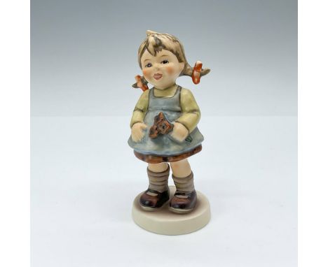 Exclusive edition celebrating the 5-year membership to the M.I. Hummel club. This hand painted porcelain figurine depicts a g