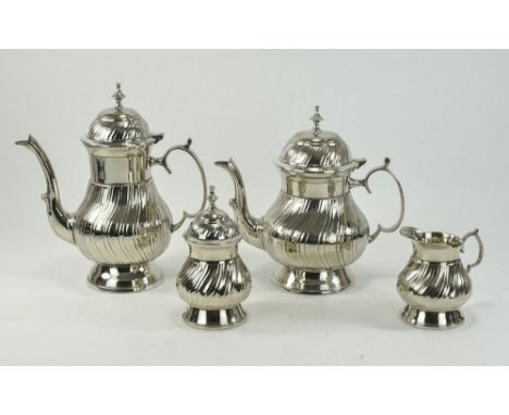 A Modern and Heavy 4 Piece Silver Plated Tea/ Coffee Service, In Pristine Condition. Height of Teapot 9 Inches, Height of Cof