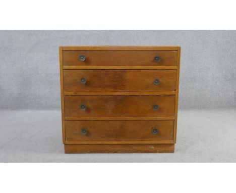 A vintage oak chest of drawers. H.70 W.75 D.46cm 