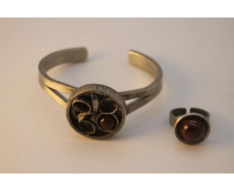 A Lysgaard Danish mid-century pewter and glazed ceramic dress ring and abstract design bangle. Makers stamp to back of ring. 