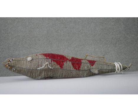A large wire and beaded koi carp design decorative light. H.75 W.25CM 