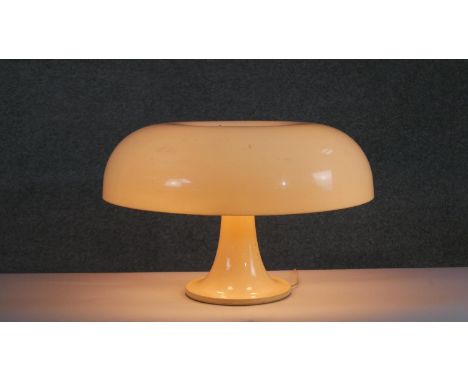 A mid 20th Century studio Artemide Milano 'Nesso' cream acrylic mushroom shaped table lamp. Impressed makers mark to the base