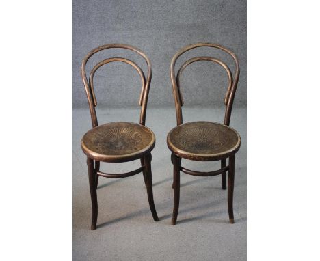 A pair of vintage bentwood Fischel cafe chairs. 