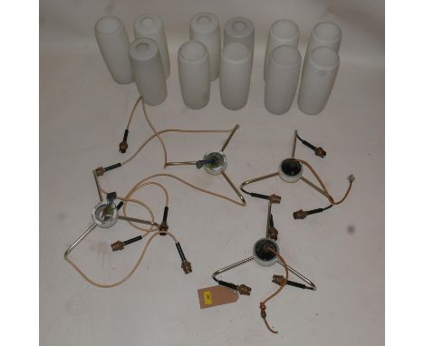 A set of four vintage triple ceiling light pendants, by Marlin, with glass shades, one shade missing 